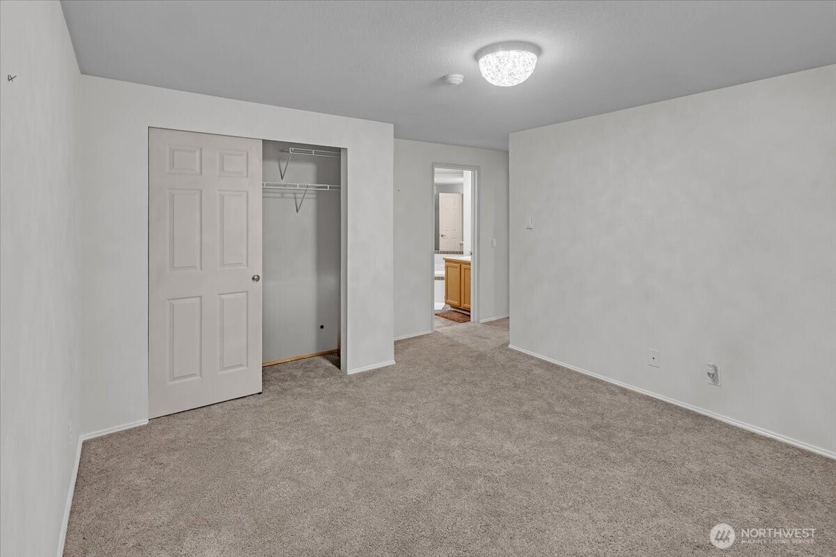 8653 Avondale Road Northeast, Unit D208 Redmond, WA 98052 - Photo 15 of 32 an empty room with closet area