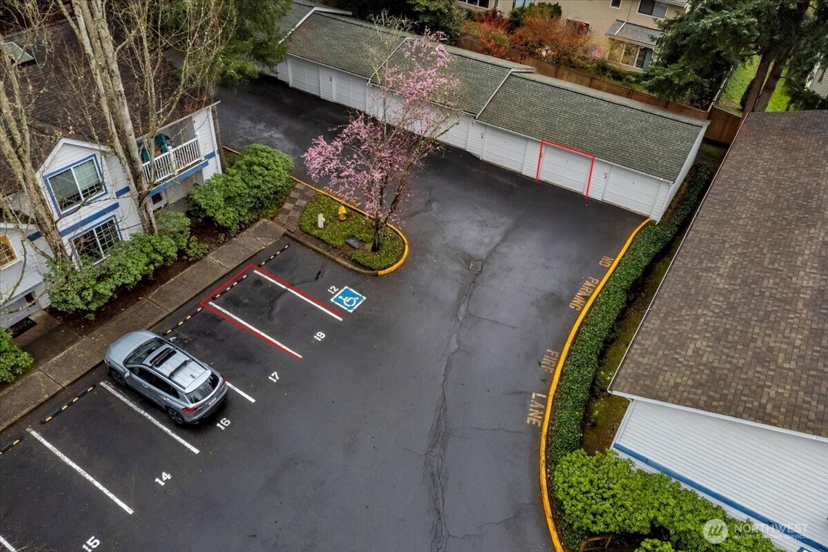 8653 Avondale Road Northeast, Unit D208 Redmond, WA 98052 - Photo 30 of 32 an aerial view of a house with a swimming pool