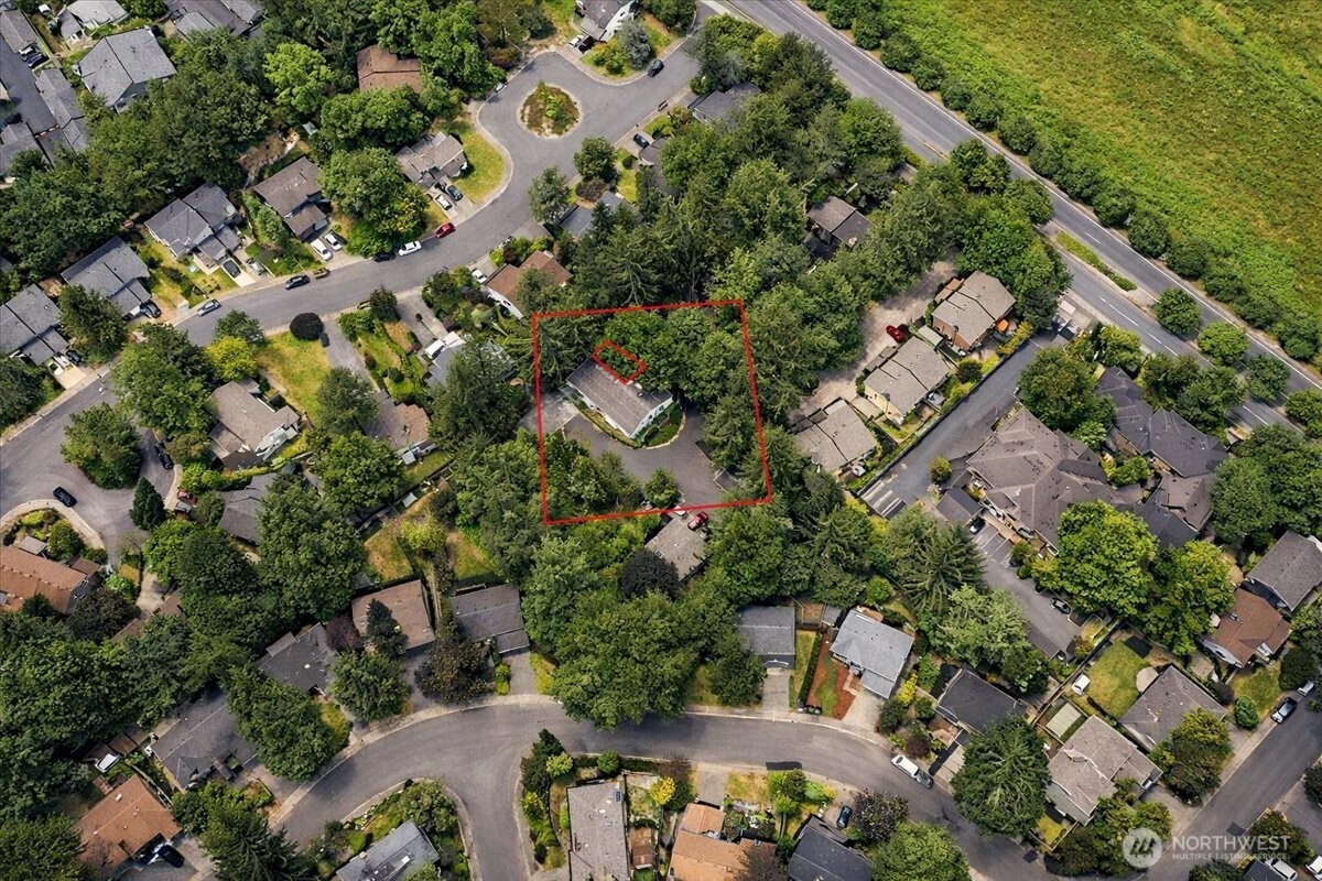 8653 Avondale Road Northeast, Unit D208 Redmond, WA 98052 - Photo 32 of 32 an aerial view of a city with lots of residential buildings