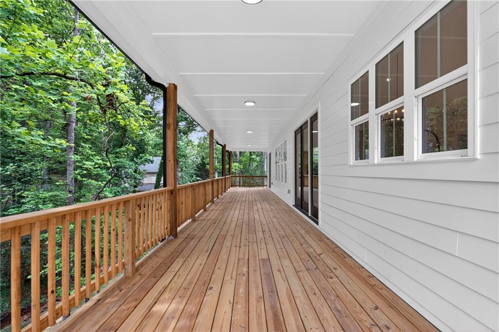 4299 Forest Place Cumming, GA 30041 - Photo 3 of 54 a view of balcony with wooden floor