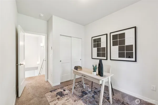 a view of livingroom with furniture and windows