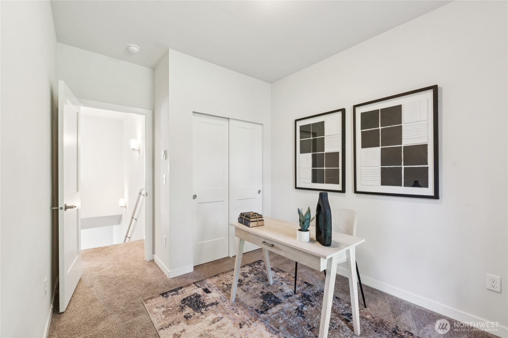 10942 Northeast 189th Place, Unit E Bothell, WA 98011 - Photo 17 of 24 a view of livingroom with furniture and windows