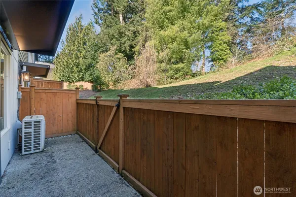 a backyard of a house with lots of green space