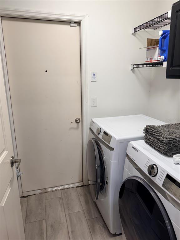 4111 Amber Ridge Lane Valrico, FL 33594 - Photo 14 of 27 a utility room with dryer and washer