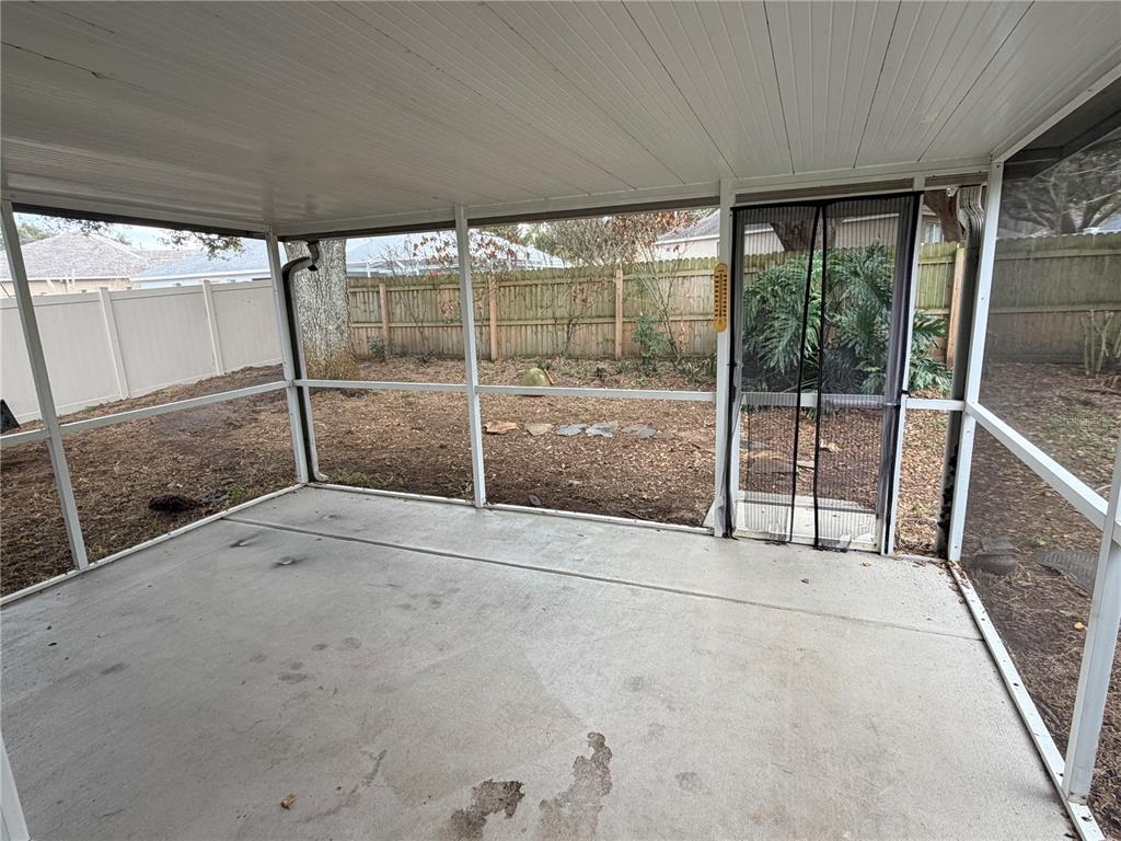 4111 Amber Ridge Lane Valrico, FL 33594 - Photo 22 of 27 a view of empty room with floor to ceiling window