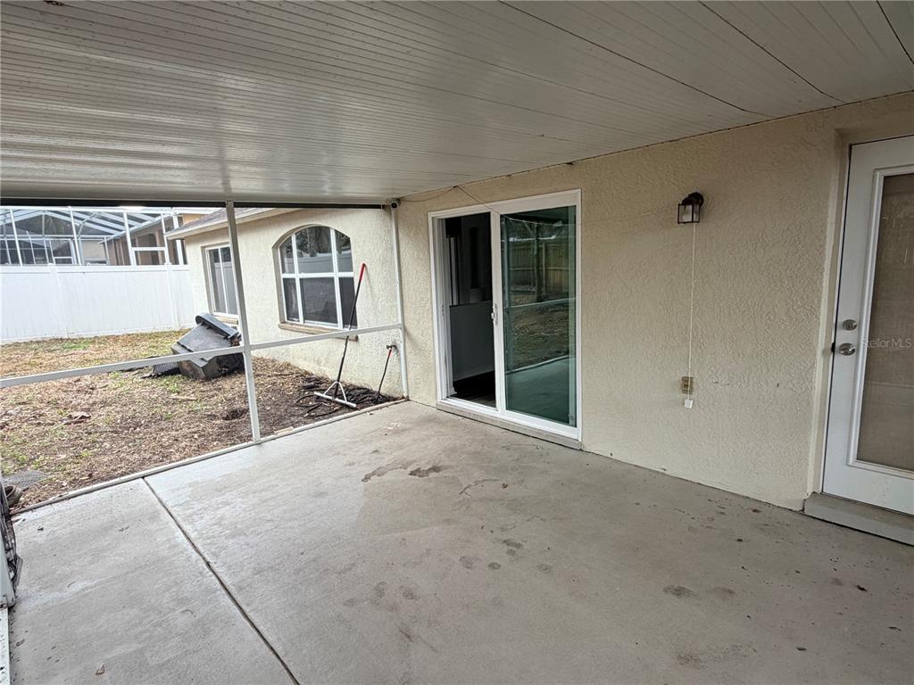 4111 Amber Ridge Lane Valrico, FL 33594 - Photo 23 of 27 a view of a house with a backyard