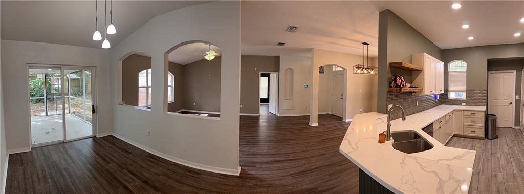 4111 Amber Ridge Lane Valrico, FL 33594 - Photo 8 of 27 a view of a living room and dining room