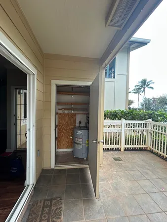 a view of a balcony with wooden floor