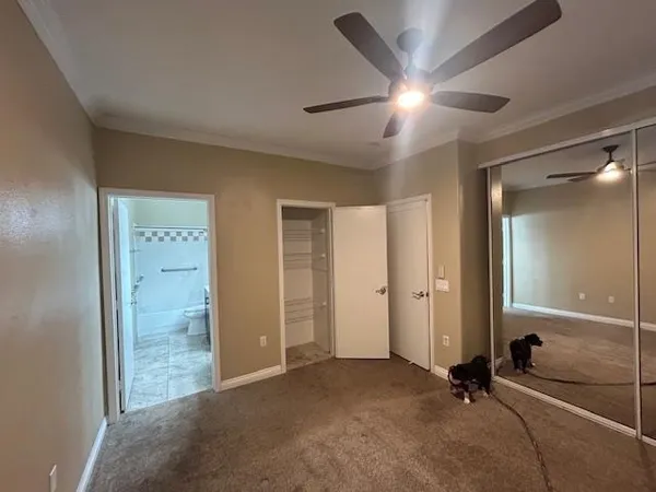 an empty room with closet area