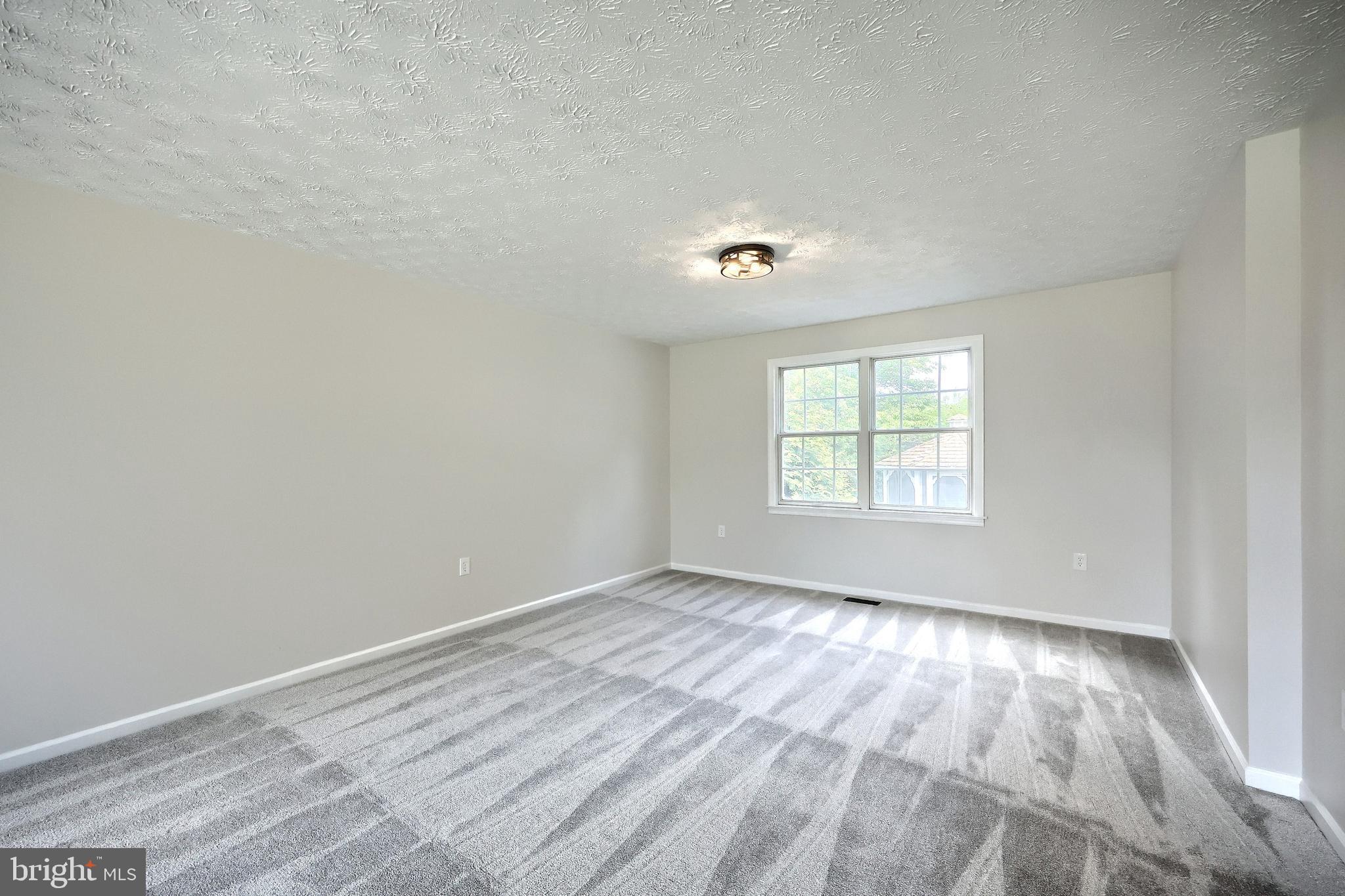 15257 Whitcraft Road New Freedom, PA 17349 - Photo 17 of 66 Back of living room.