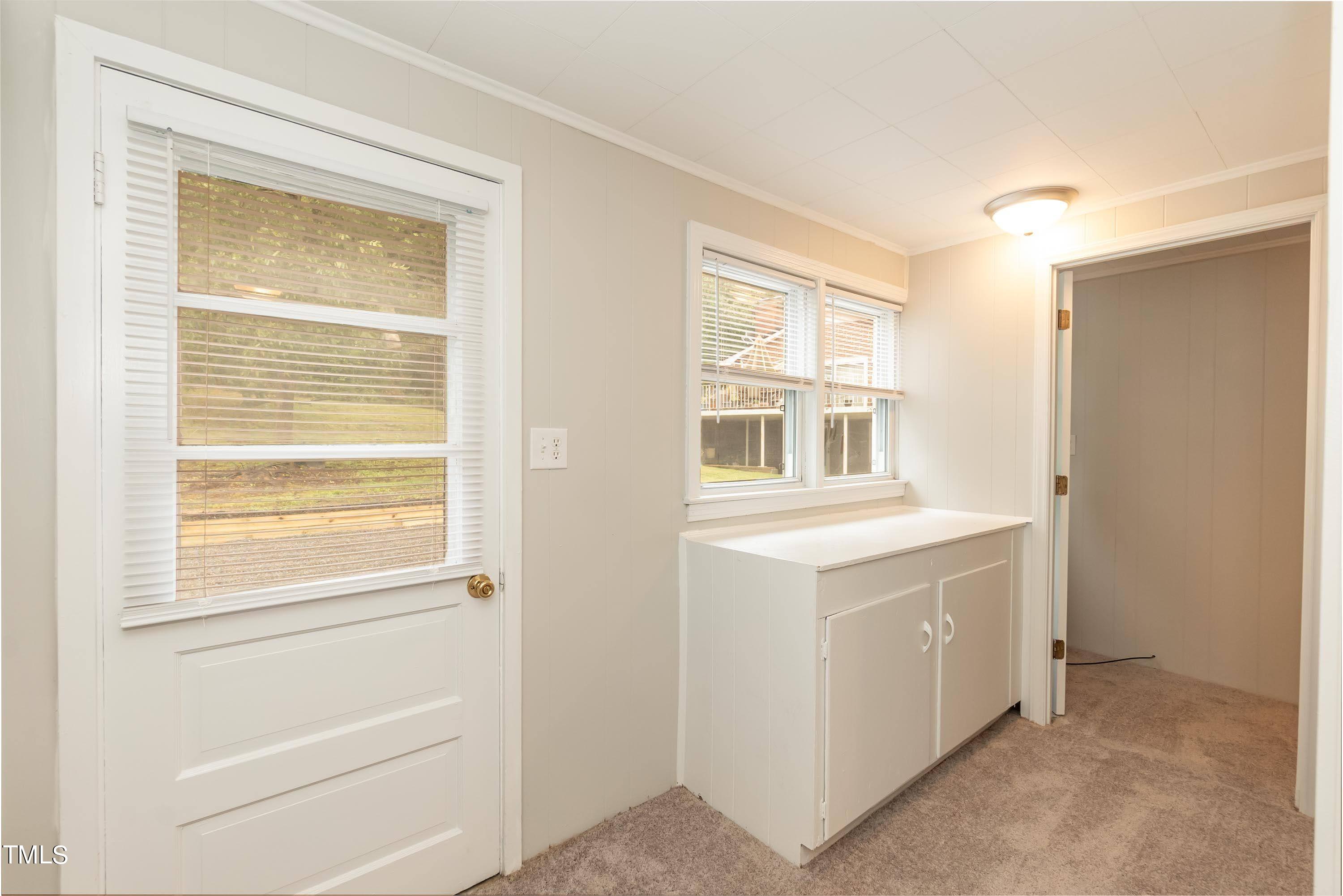 139 Johnson Street Roxboro, NC 27573 - Photo 16 of 30 a utility room with dryer and washer