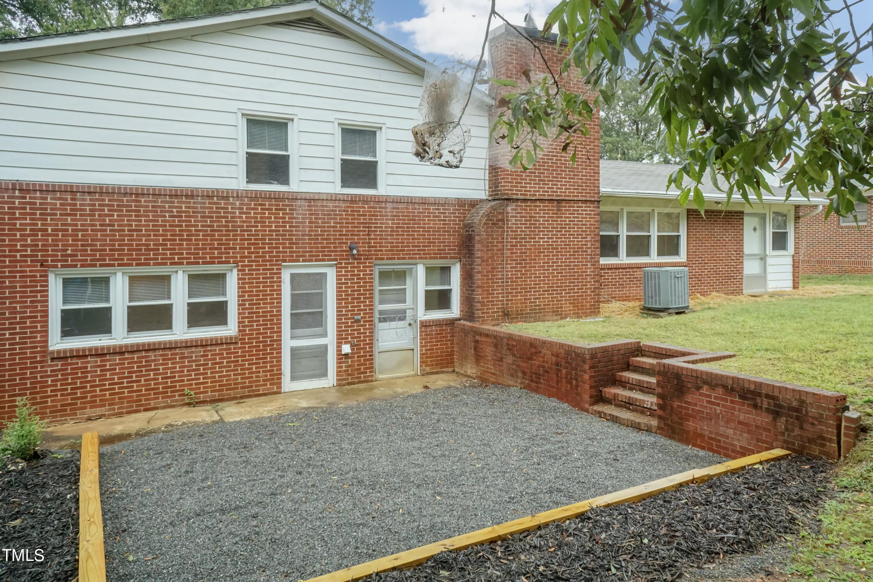 139 Johnson Street Roxboro, NC 27573 - Photo 26 of 30 front view of house with a yard
