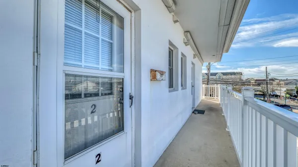 a view of a hallway with a sink