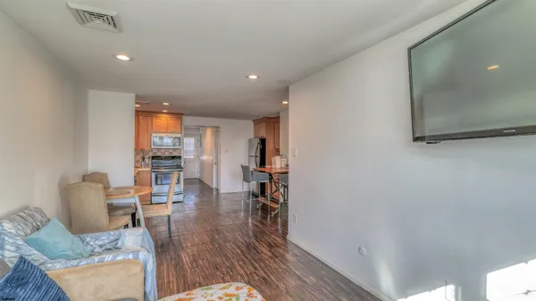 a living room with furniture and a table