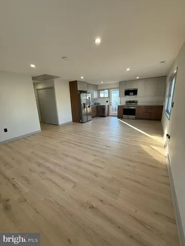 a view of a kitchen with a sink