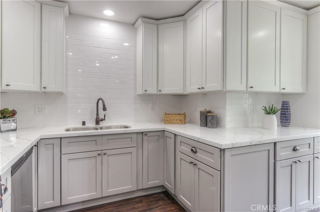 1925 North Screenland Drive Burbank, CA 91505 - Photo 14 of 31 a kitchen with white cabinets and white appliances