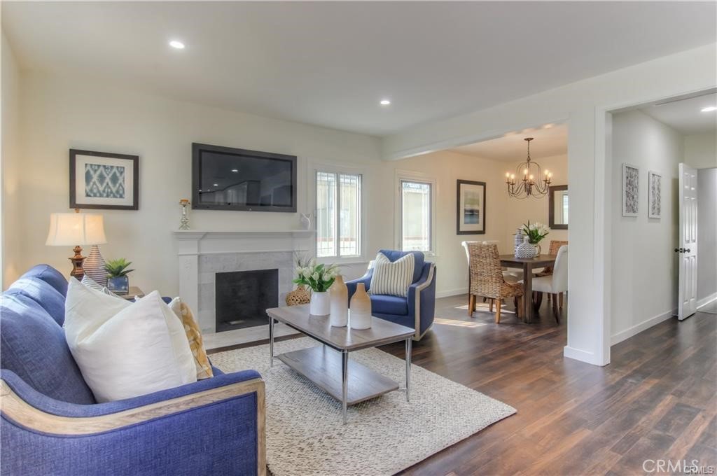 1925 North Screenland Drive Burbank, CA 91505 - Photo 16 of 31 a living room with furniture and a fireplace