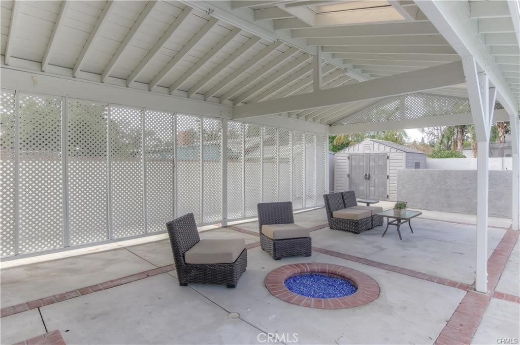 1925 North Screenland Drive Burbank, CA 91505 - Photo 25 of 31 a living room with furniture and a rug