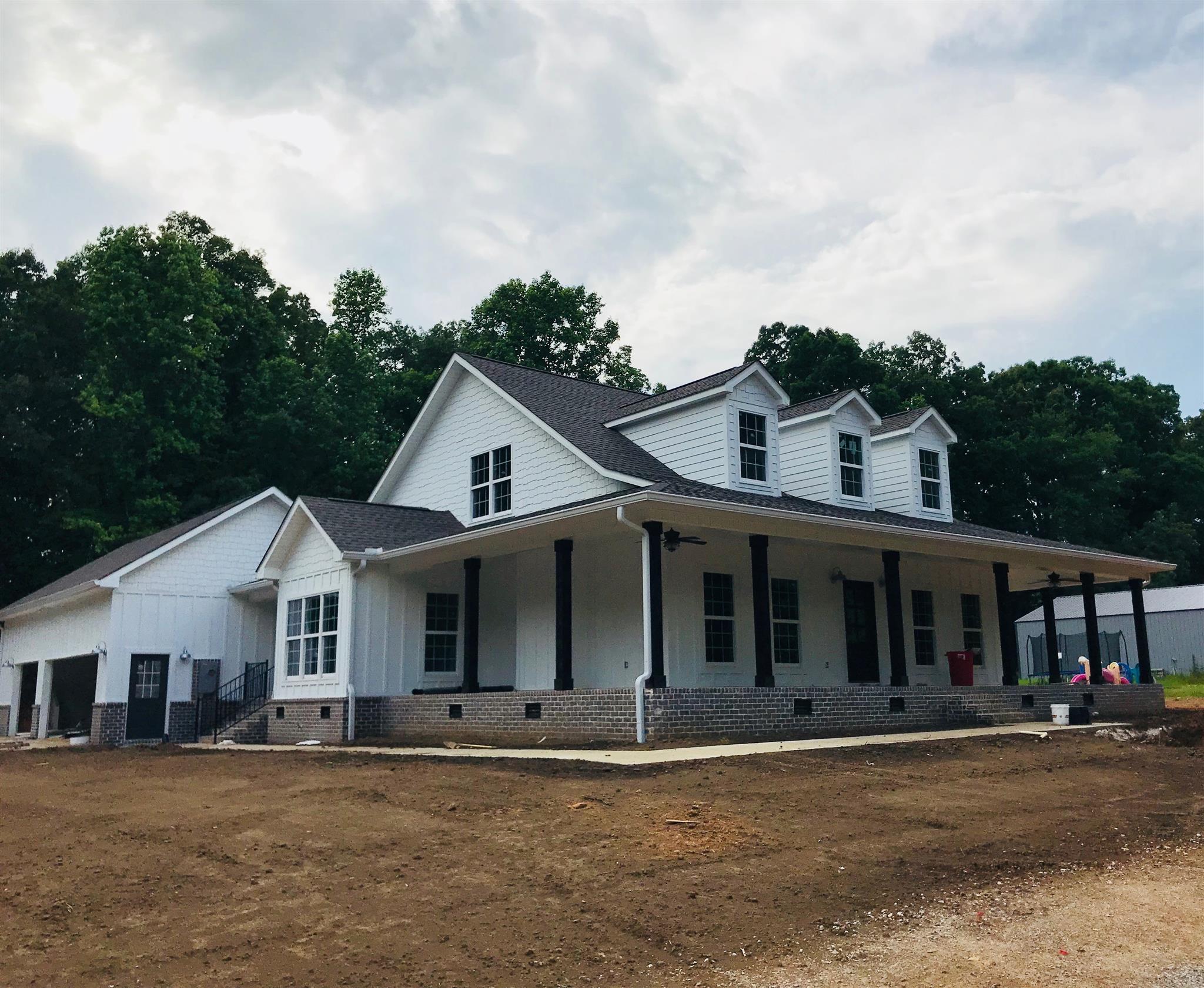 84 Old Quick Road Fayetteville, TN 37334 - Photo 1 of 6 front view of a house with a yard