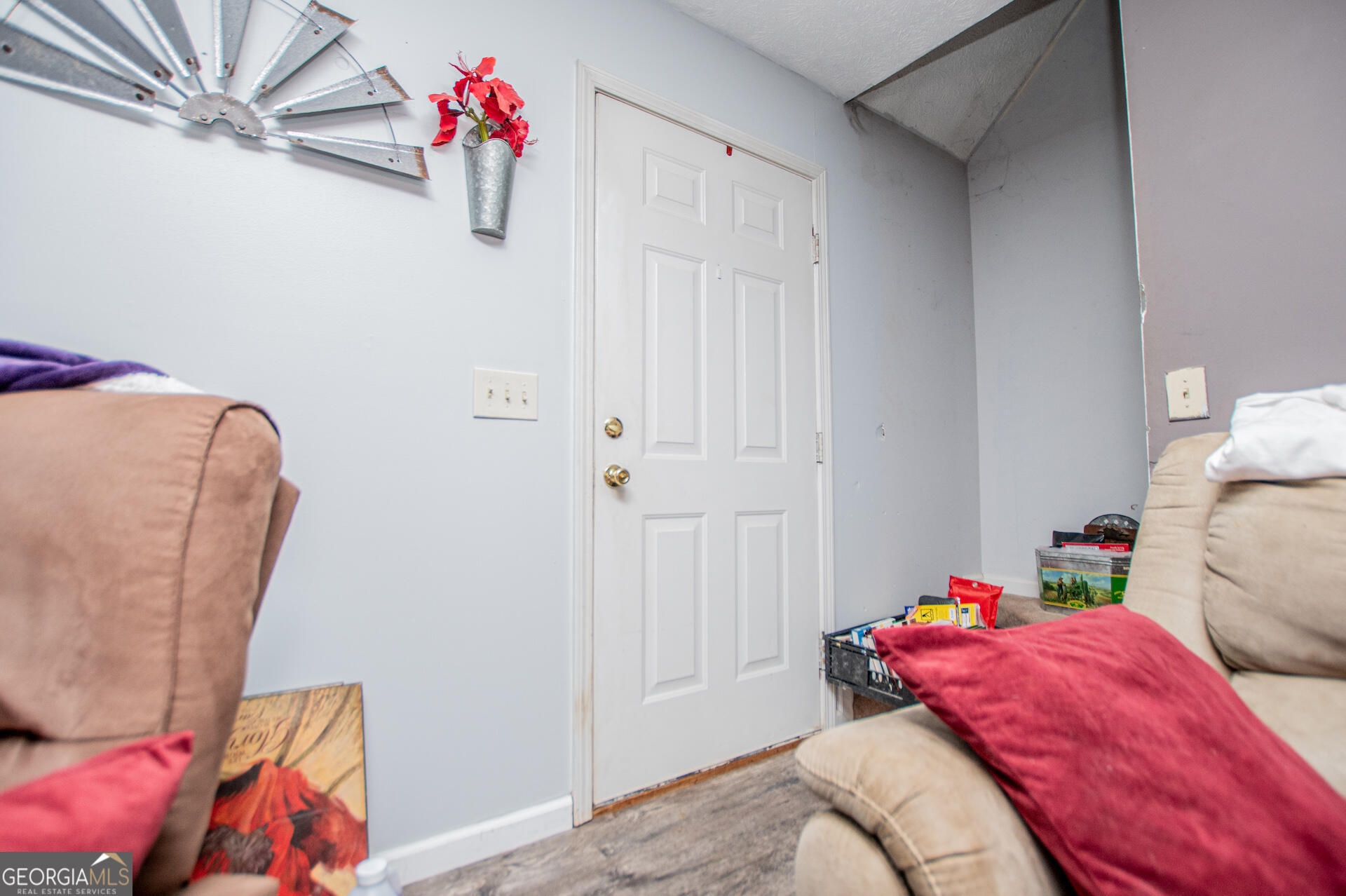 1227 Horsley Mill Road Carrollton, GA 30116 - Photo 12 of 70 a bedroom with a bed and a couch