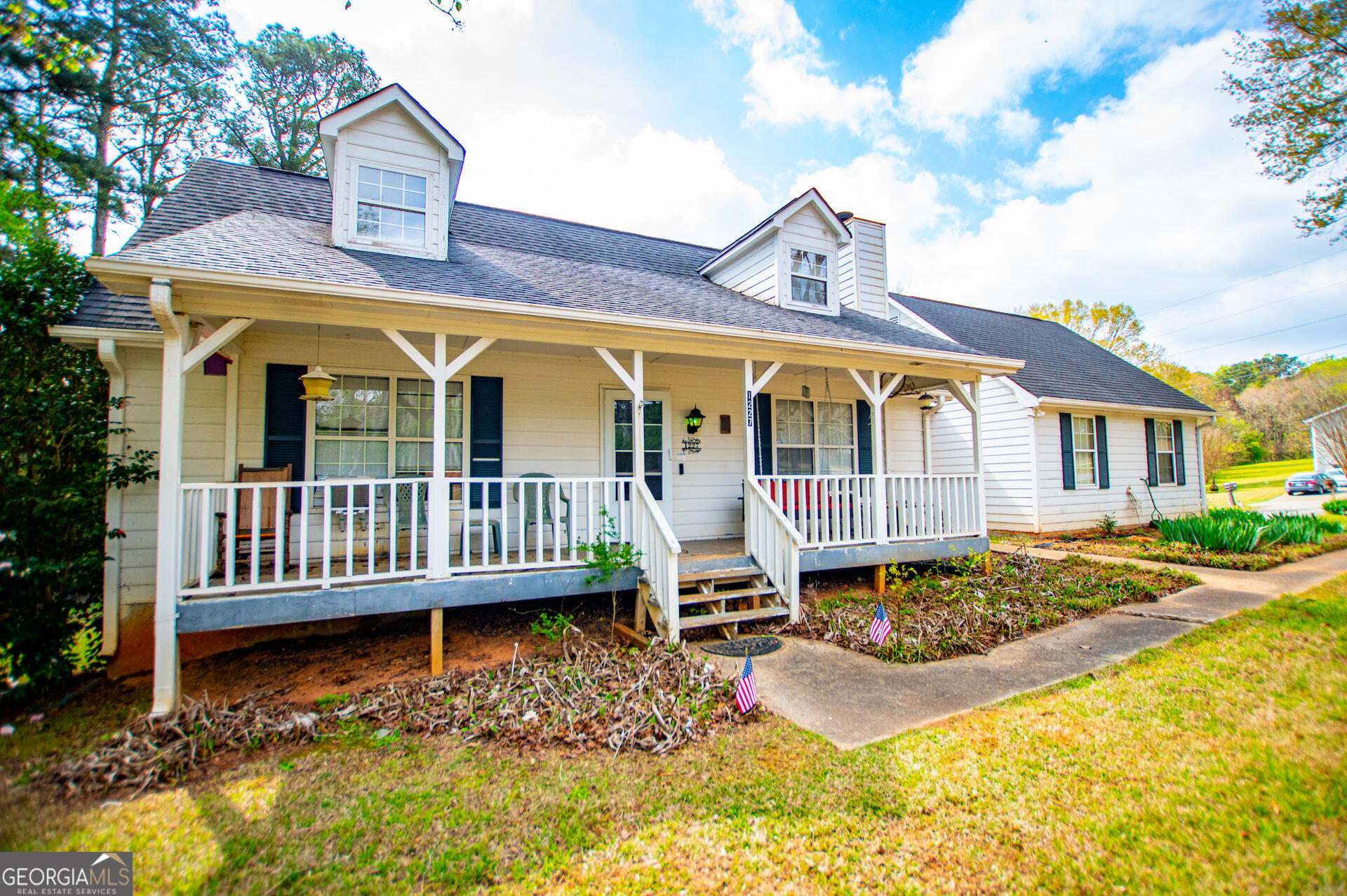 1227 Horsley Mill Road Carrollton, GA 30116 - Photo 2 of 70 a view of a house with wooden deck and a yard