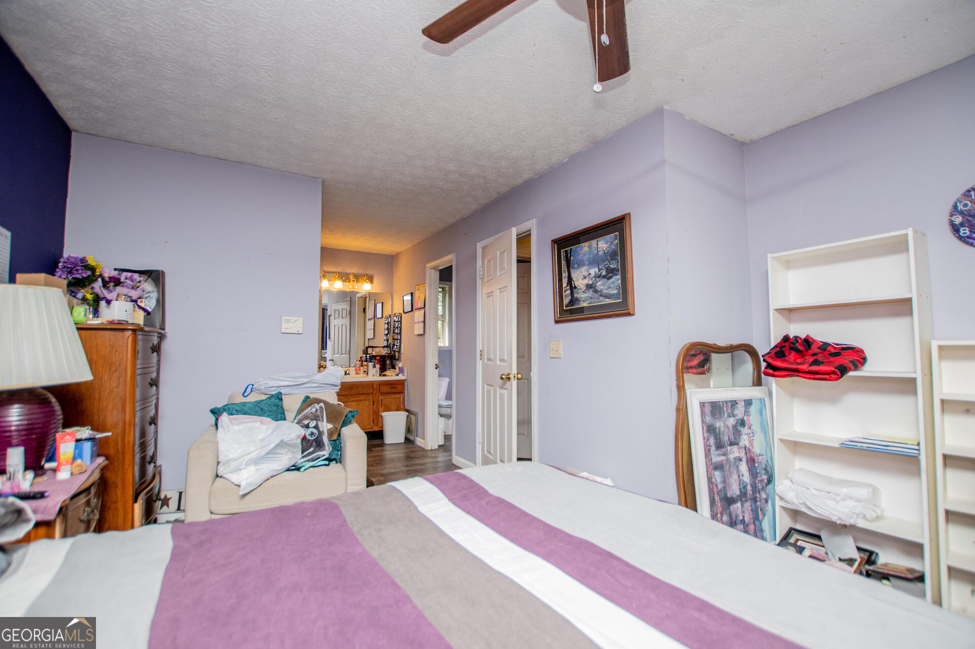 1227 Horsley Mill Road Carrollton, GA 30116 - Photo 27 of 70 a bedroom with furniture and a bed