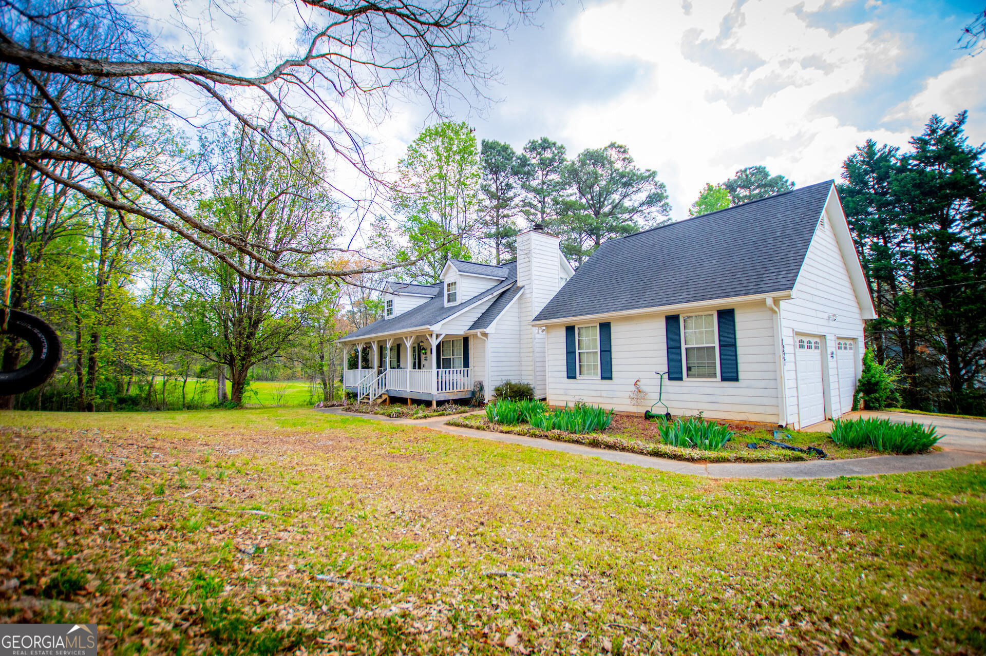 1227 Horsley Mill Road Carrollton, GA 30116 - Photo 3 of 70 a front view of house with yard and green space