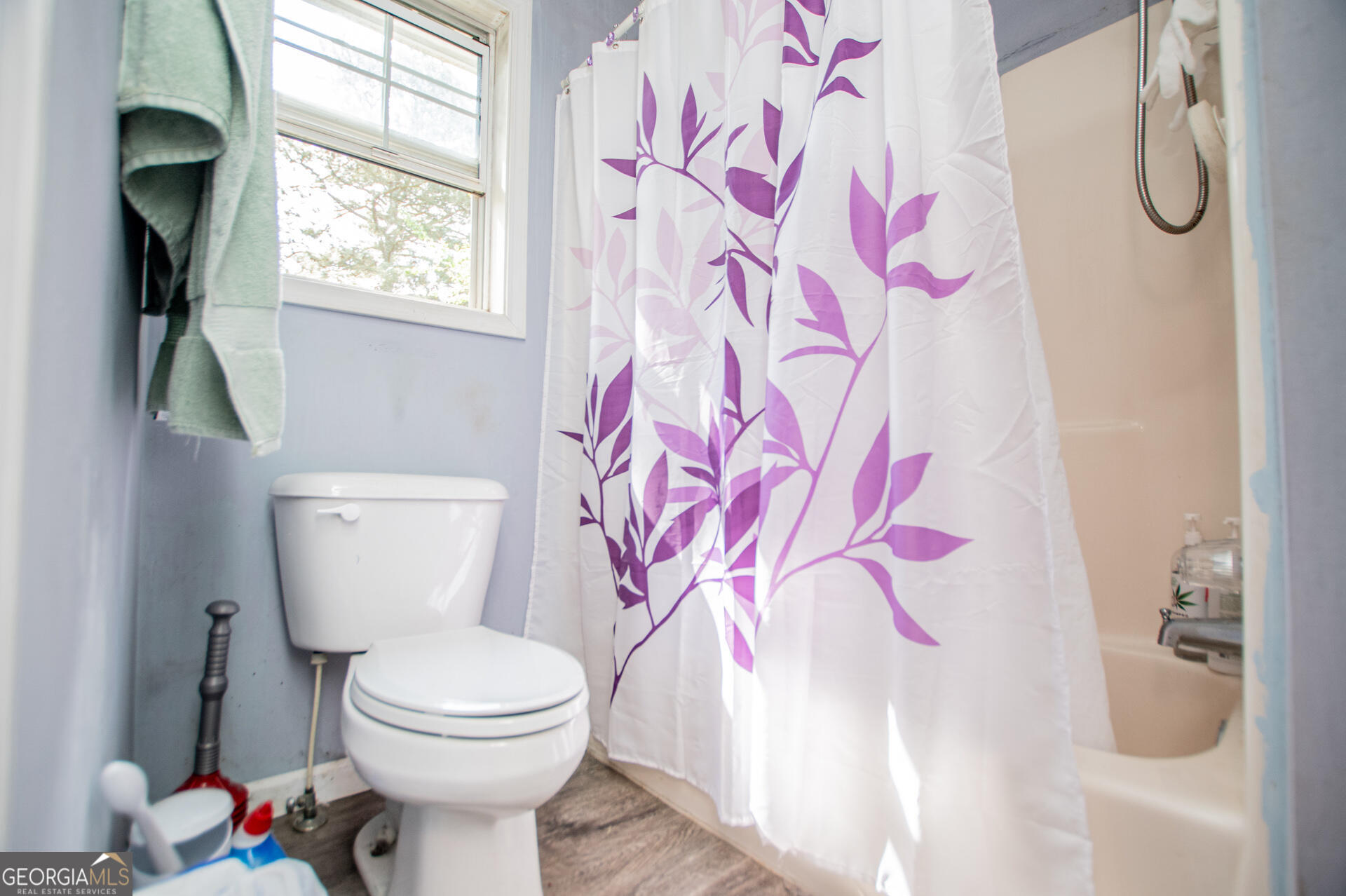 1227 Horsley Mill Road Carrollton, GA 30116 - Photo 31 of 70 a bathroom with a toilet sink and mirror