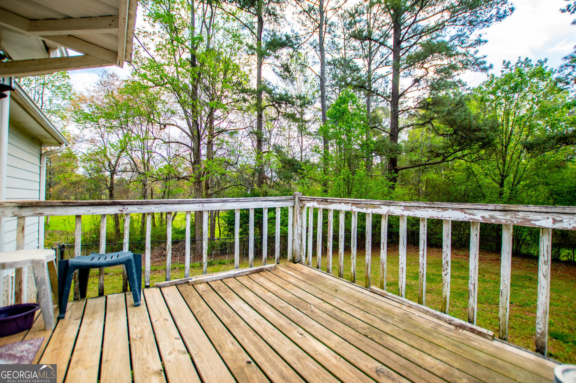 1227 Horsley Mill Road Carrollton, GA 30116 - Photo 44 of 70 a view of balcony with wooden floor and fence