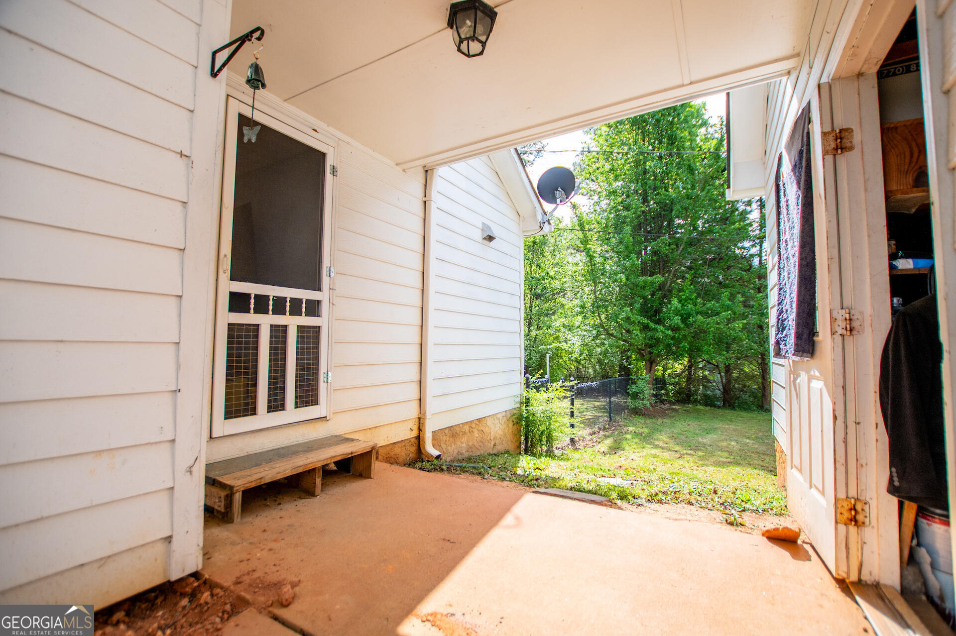 1227 Horsley Mill Road Carrollton, GA 30116 - Photo 46 of 70 a house view with a backyard space