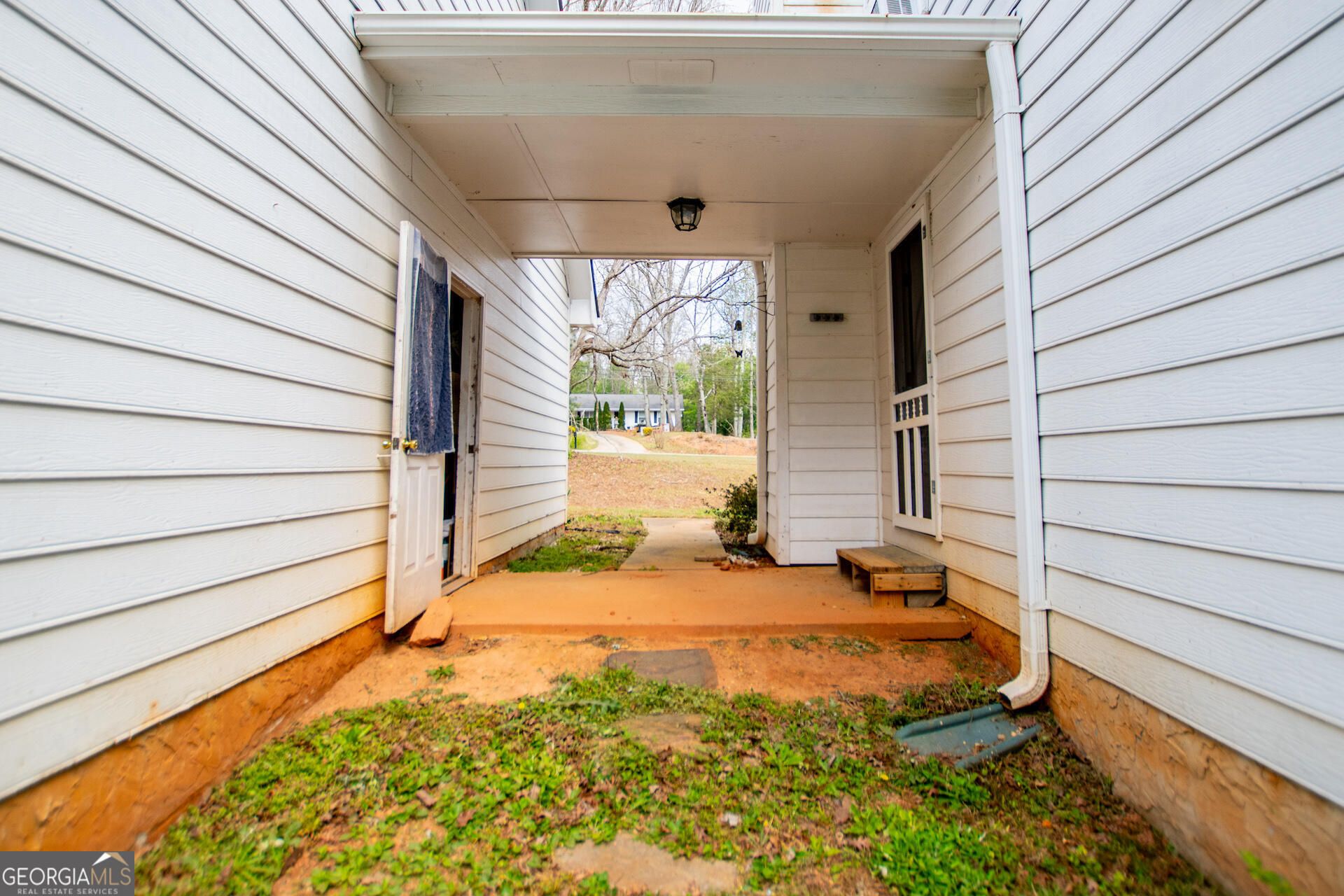 1227 Horsley Mill Road Carrollton, GA 30116 - Photo 48 of 70 a view of a backyard with a garden
