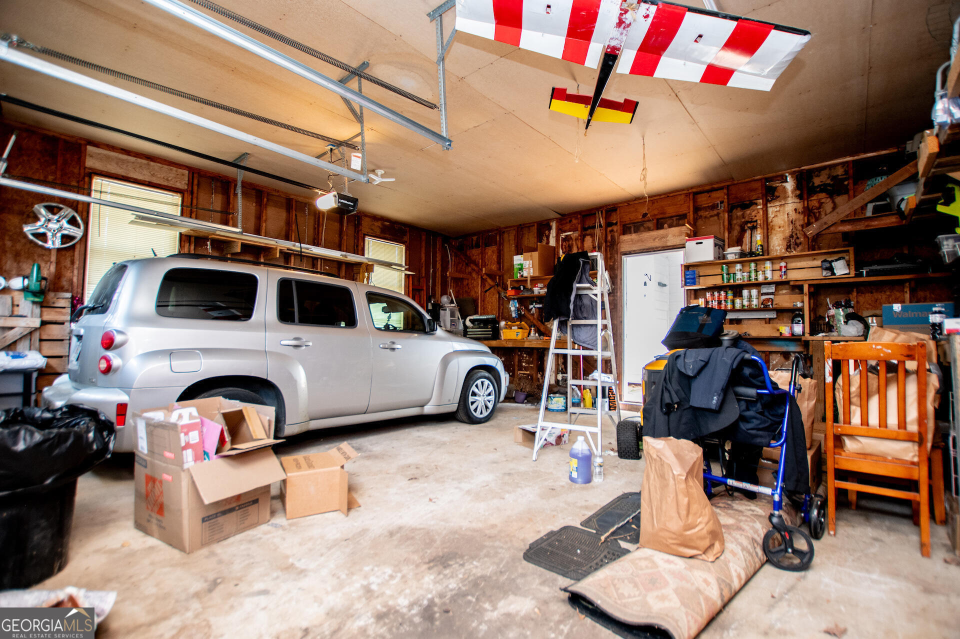 1227 Horsley Mill Road Carrollton, GA 30116 - Photo 49 of 70 a view of parking garage with cars
