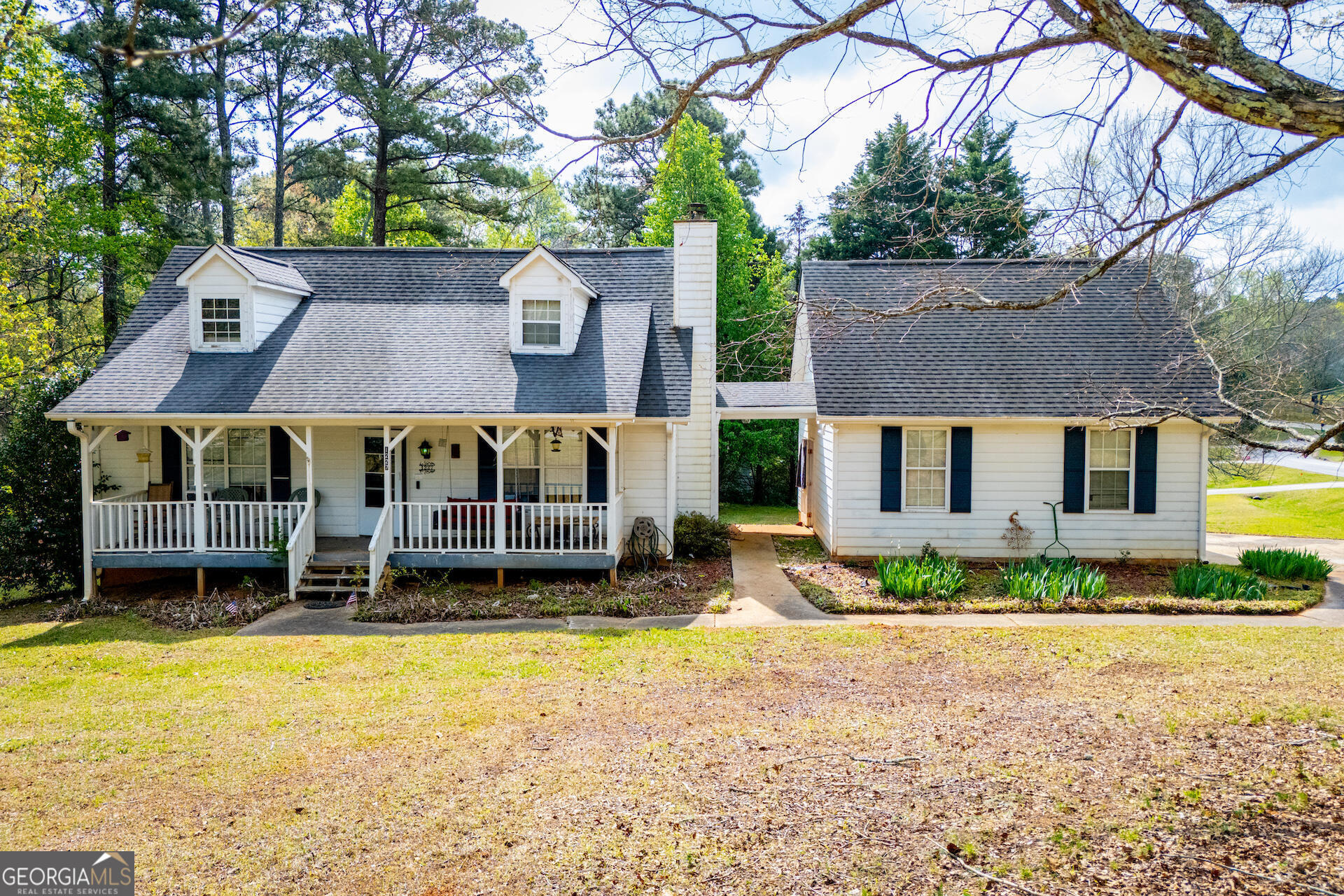 1227 Horsley Mill Road Carrollton, GA 30116 - Photo 55 of 70 a view of a house with a swimming pool