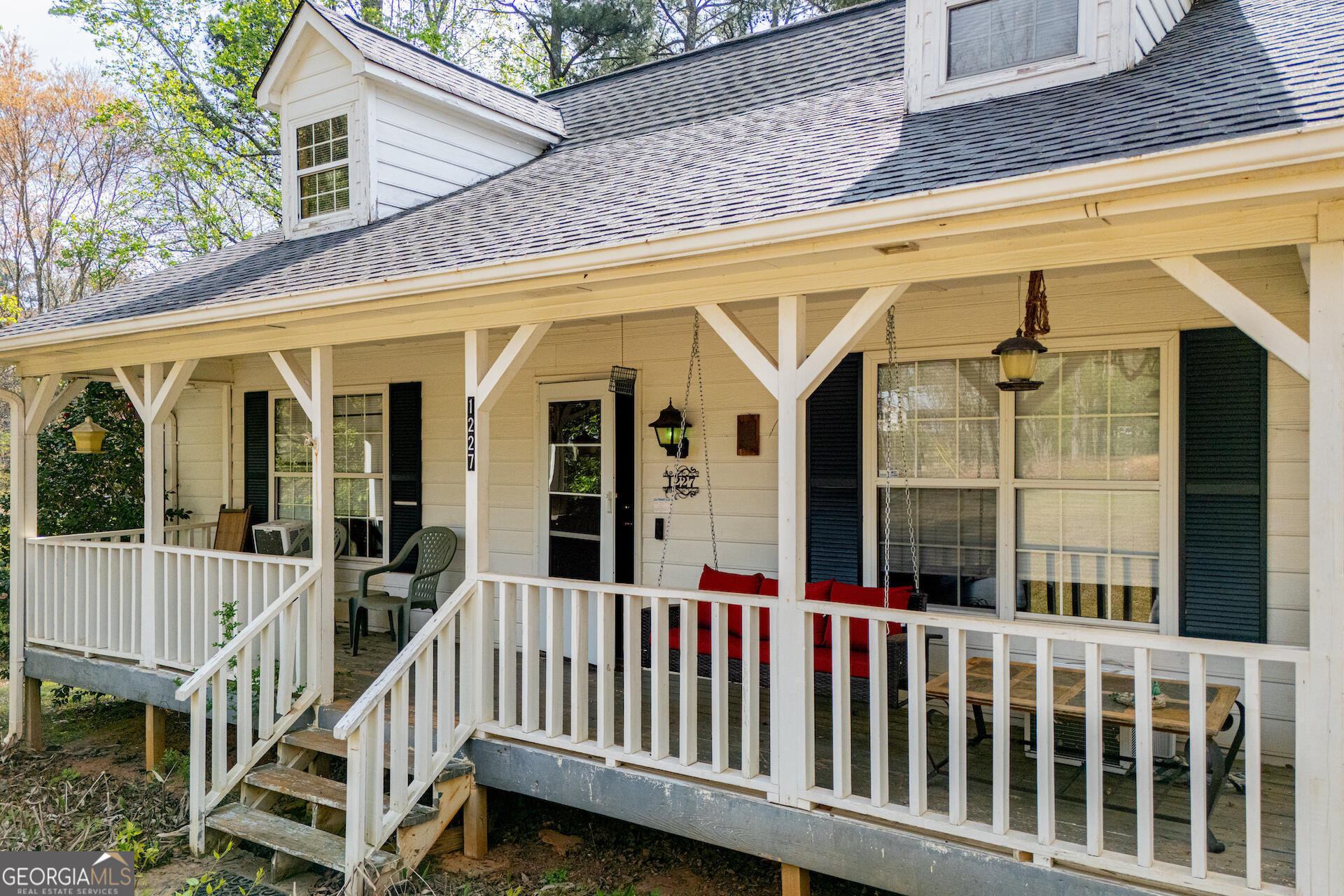 1227 Horsley Mill Road Carrollton, GA 30116 - Photo 59 of 70 a view of a house with a porch
