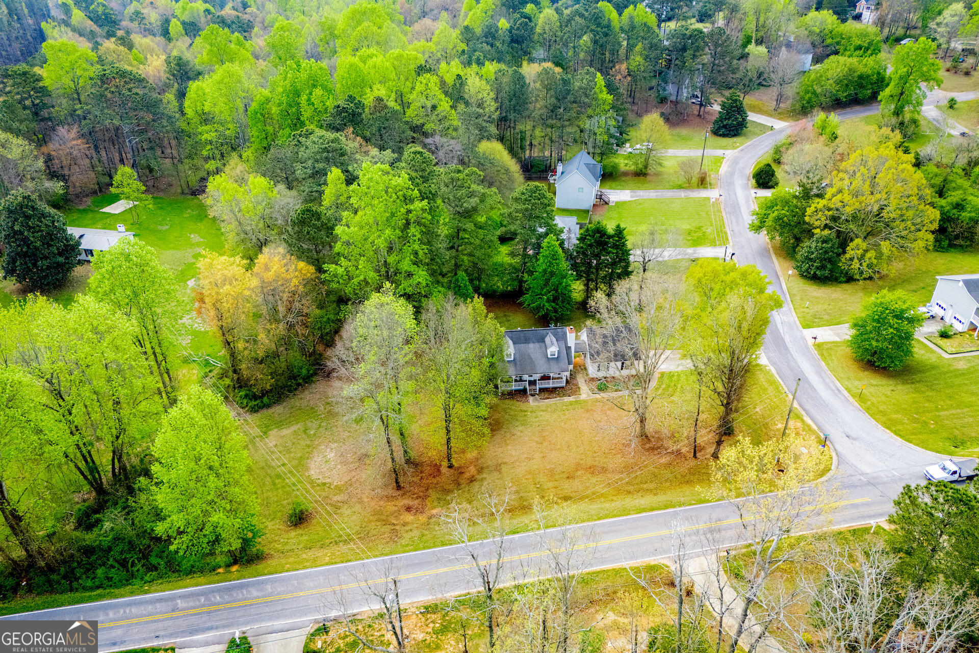 1227 Horsley Mill Road Carrollton, GA 30116 - Photo 62 of 70 a view of a swimming pool with a patio