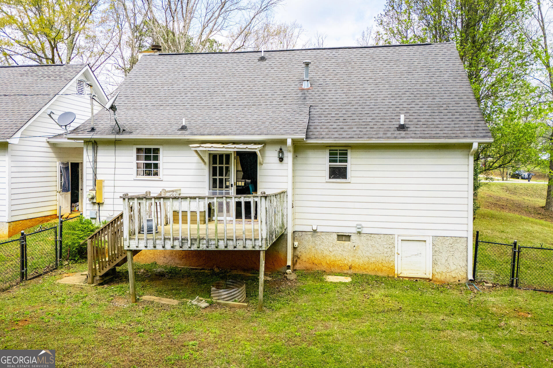 1227 Horsley Mill Road Carrollton, GA 30116 - Photo 66 of 70 a view of a house with roof deck