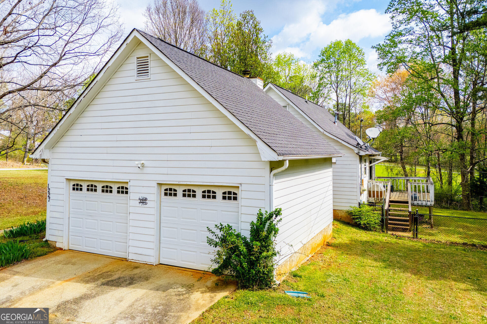 1227 Horsley Mill Road Carrollton, GA 30116 - Photo 69 of 70 a view of a house with a yard