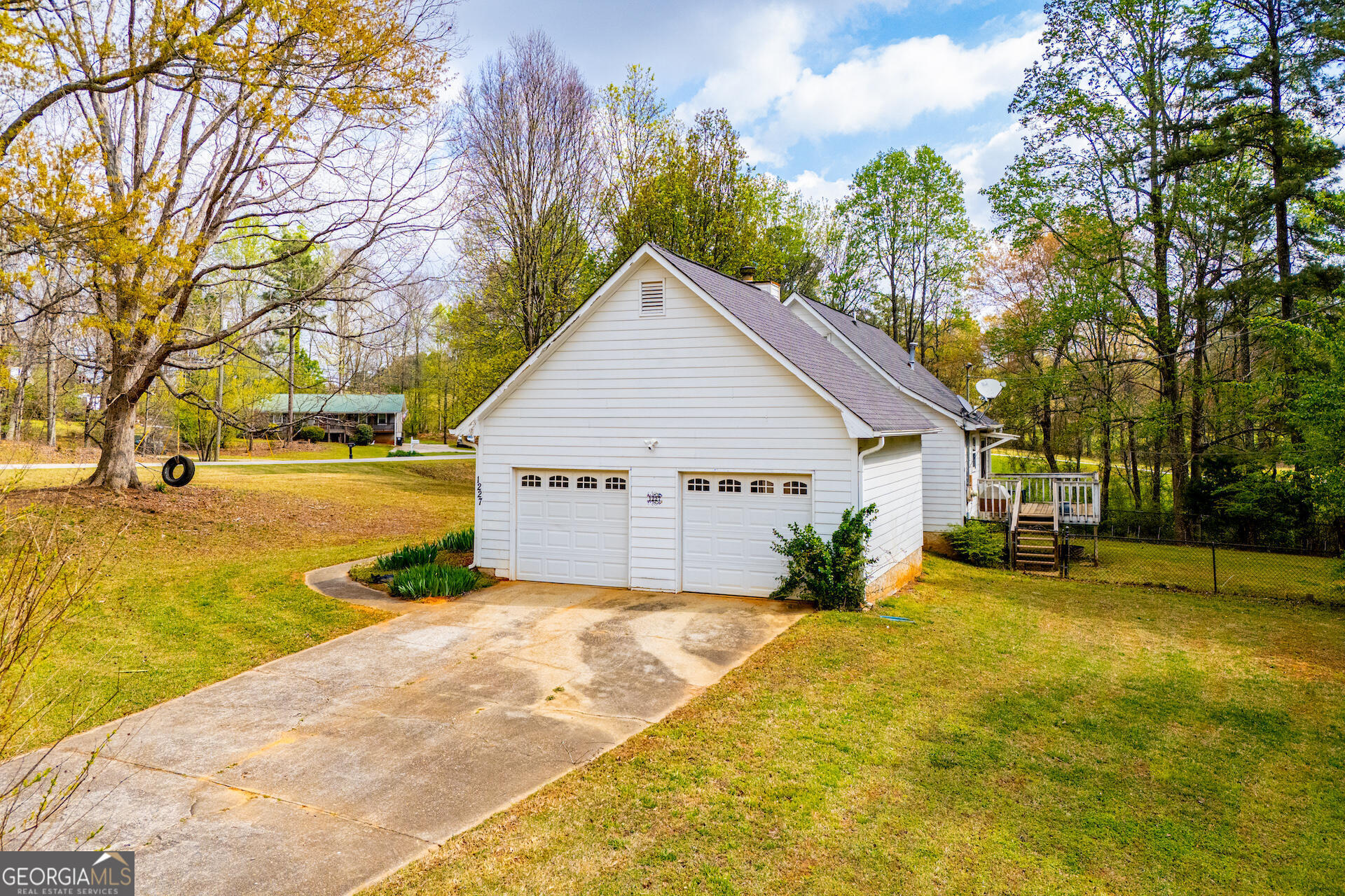 1227 Horsley Mill Road Carrollton, GA 30116 - Photo 70 of 70 a view of a house with a yard covered in snow