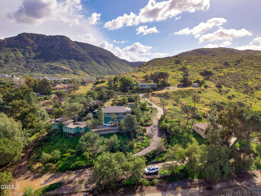 a view of a city with mountains in the background