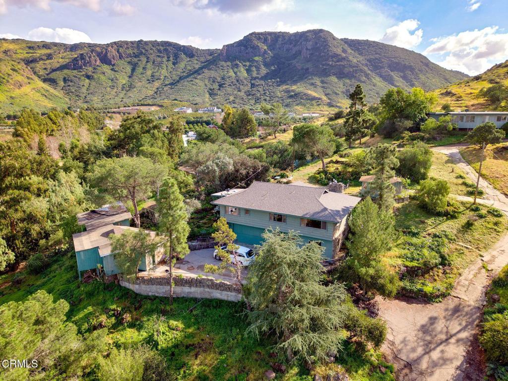 10840 Santa Rosa Road Camarillo, CA 93012 - Photo 24 of 55 a view of a house with a mountain and a lake view