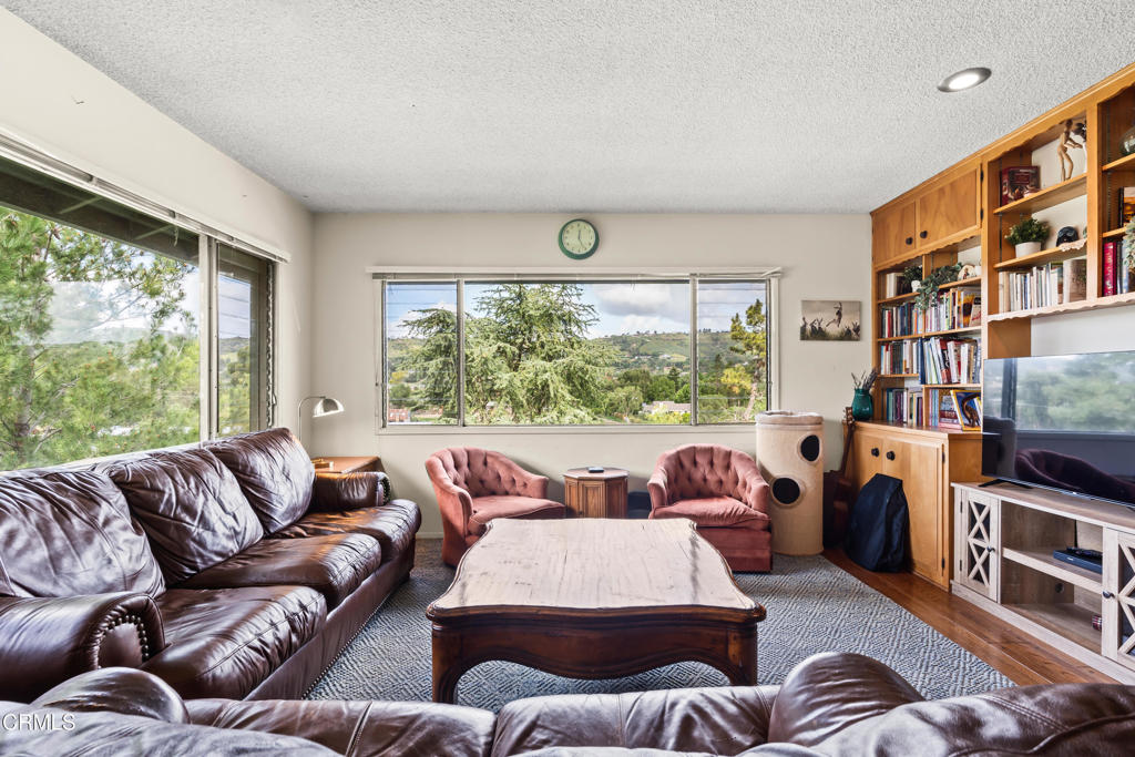 10840 Santa Rosa Road Camarillo, CA 93012 - Photo 29 of 55 a living room with furniture and a large window