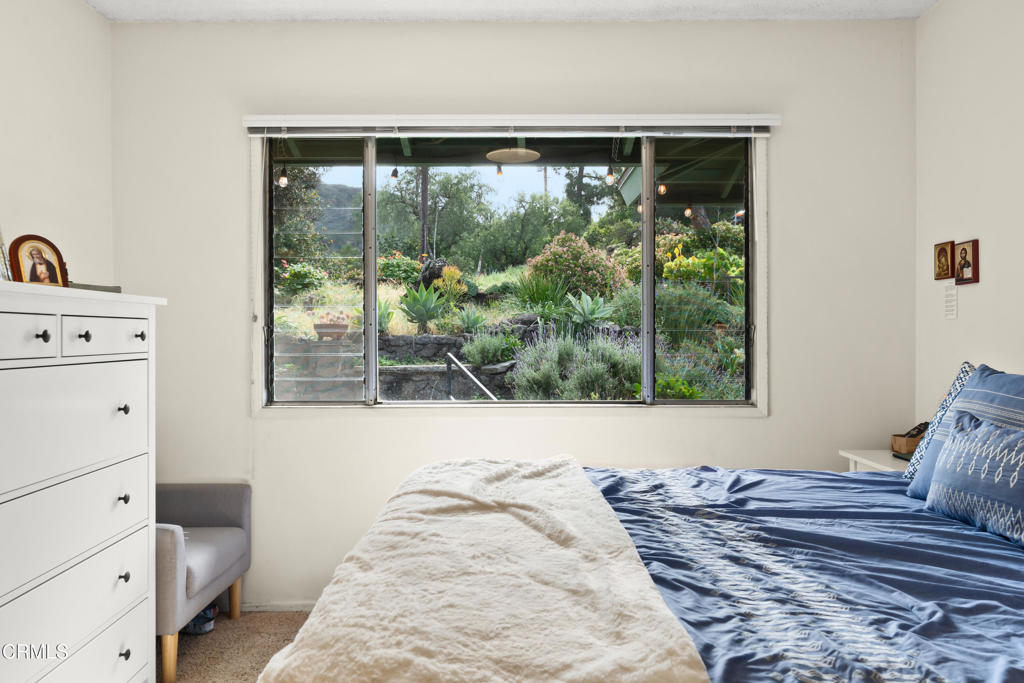10840 Santa Rosa Road Camarillo, CA 93012 - Photo 32 of 55 a room with a bed and large window