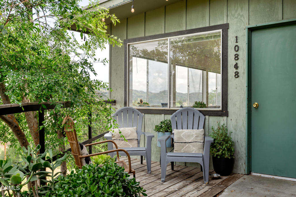 10840 Santa Rosa Road Camarillo, CA 93012 - Photo 6 of 55 a view of a chair and tables in the balcony