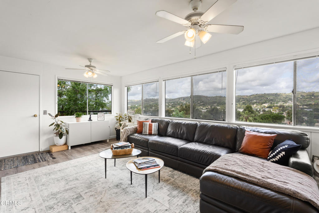10840 Santa Rosa Road Camarillo, CA 93012 - Photo 10 of 55 a living room with furniture and a large window with balcony view