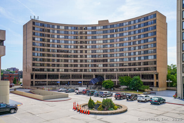 a front view of a building with outdoor space