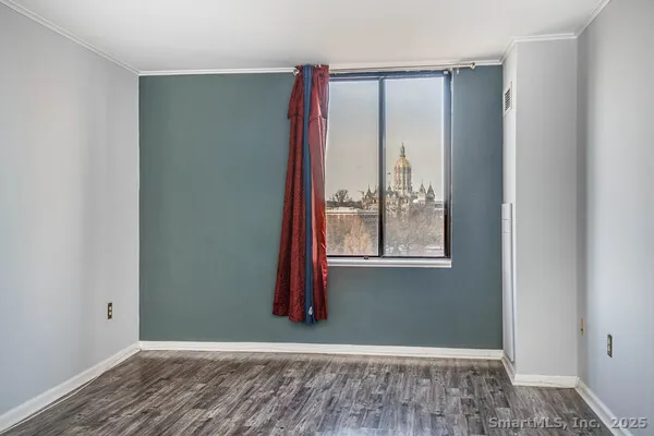 a view of an empty room with window