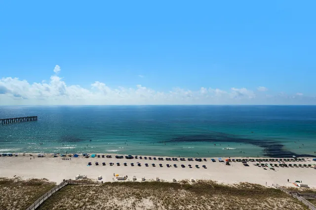 a view of a yard with an ocean