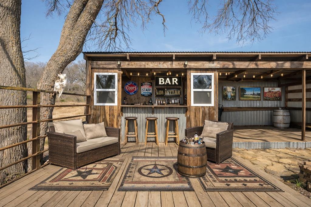 1325 North Katy Road Elm Mott, TX 76640 - Photo 18 of 29 Outdoor entertainment barn. Digitally staged to show potential.