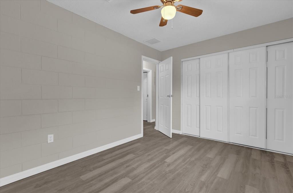 2307 Mispah Avenue, Unit A Leesburg, FL 34748 - Photo 19 of 25 a view of an empty room with a window