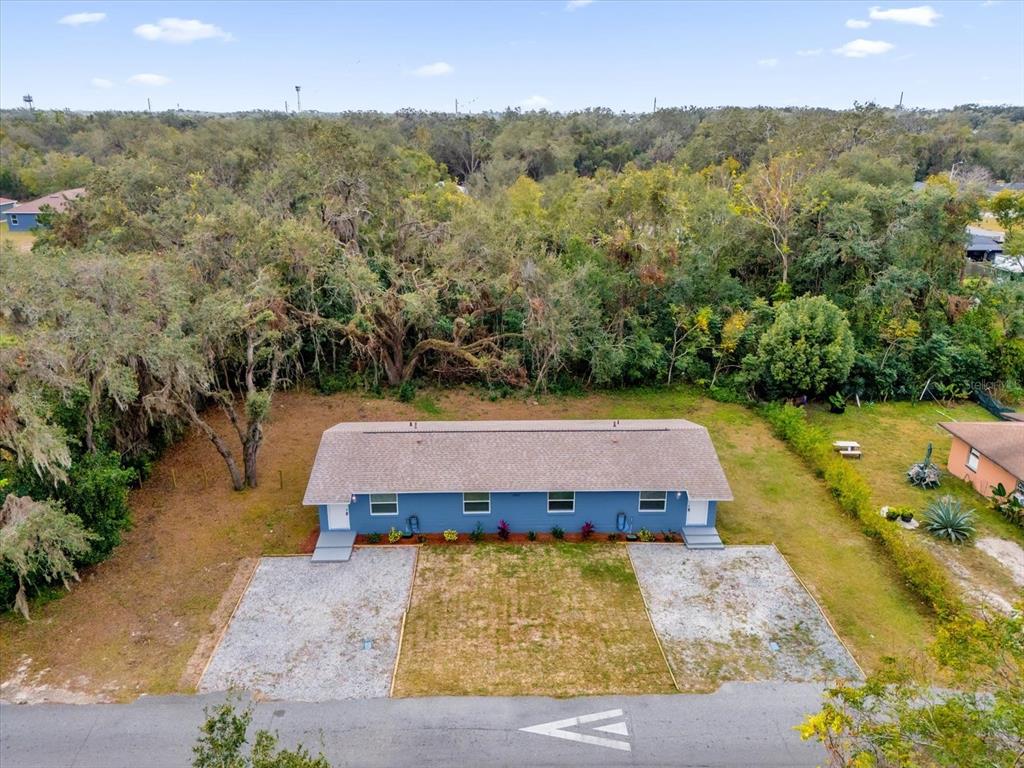 2307 Mispah Avenue, Unit A Leesburg, FL 34748 - Photo 23 of 25 a view of a swimming pool with a yard